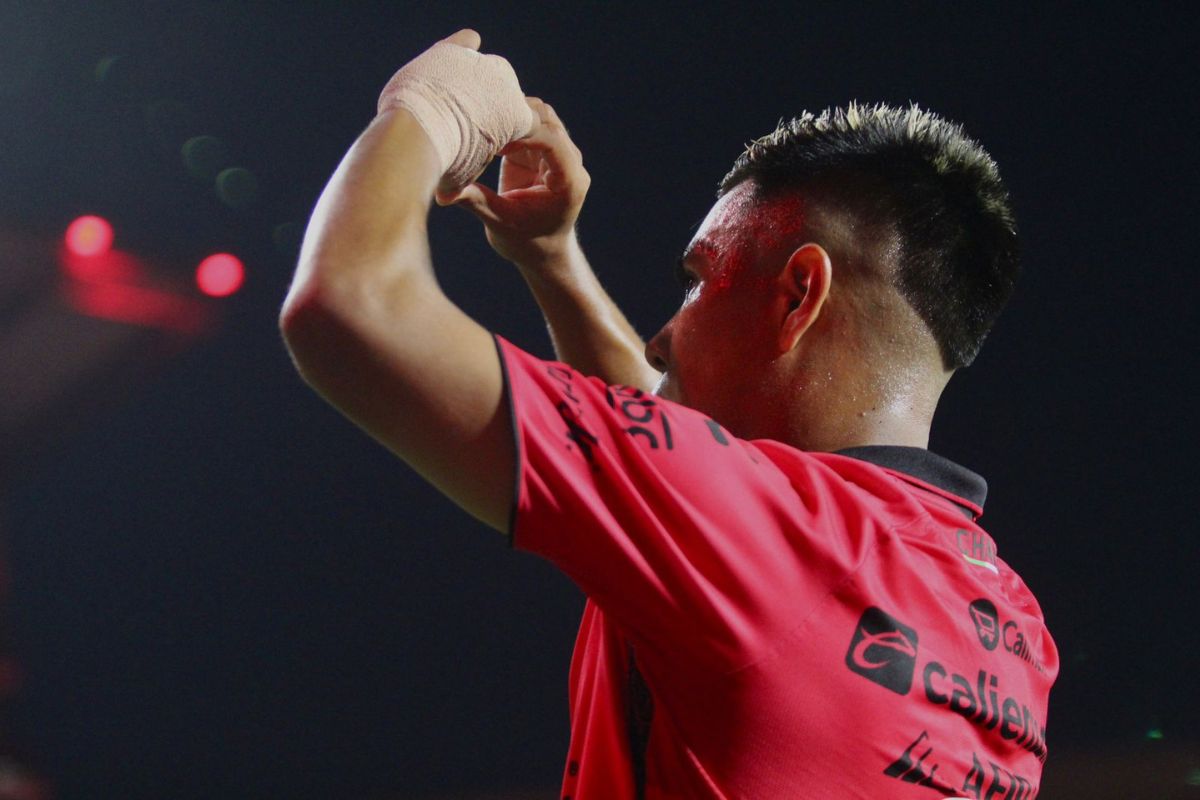 Efraín Álvarez celebra el cuarto gol de los Xolos. (Foto: Mauricio Figueroa - BC Entertainment)